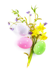 Wall Mural - Easter eggs with spring flowers violet and branch blooming willow. Festive card top view. Isolated on white background.