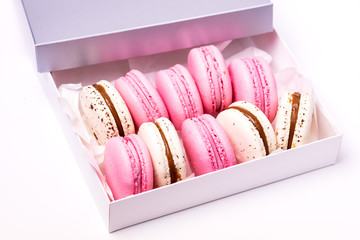 Wall Mural - Pink Strawberry and White Caramel and Salt Macarons in Box French Delicate Dessert Pink and White Pastel Macarons