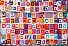 Colorfull Handmade Crochet Blanket Afgan Made From Woolen Granny Squares Hanging Outdoors