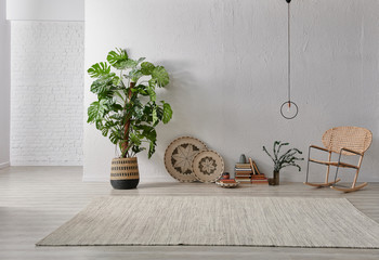 Grey stone wall, white brick background, interior style, chair lamp and object.