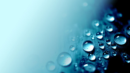 vivid blue water drop texture background for cold , freshness and drinking concept