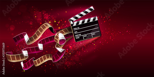 Fotomural Cinema producers clapperboard for film making flying in Space with trails of stars and film-strip films