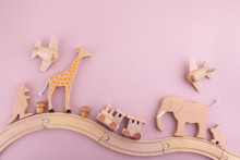 Zero Waste. Eco Wooden Toys On Pink Background. Flat Lay. Top View