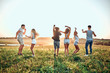 © HBS - Group of happy young people enjoying summer vacation
