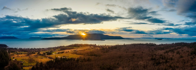 Panoramic Sunset View of Orcas Island, Washington. Aerial view of Orcas Island as seen from Lummi island in the Salish Sea area of western Washington state.