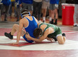 © Joe - High School wrestlers competing at a wrestling meet