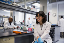 Smiling Scientist In Laboratory