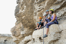 Rock Climbers Resting Sitting On Rock