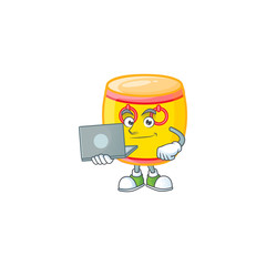 Canvas Print - A clever chinese gold drum mascot character working with laptop