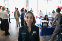 Portrait Smiling Young Woman At Voter Polling Place