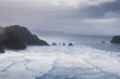 Sunlight illuminates the sea on a stormy morning on the Oregon coast