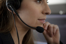 Close Up Woman With Headset Working At Call Center