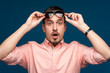 © pavel_shishkin - Portrait of surprised man with sunglasses