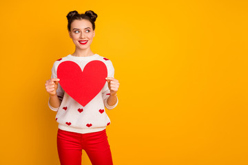 Sticker - Photo of pretty lady hold paper heart demonstrate creative idea postcard date invitation wear white red hearts pattern print sweater pants isolated yellow color background