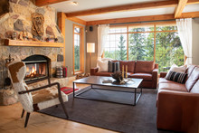 Home Showcase Interior Living Room With Leather Sofas And Stone Fireplace