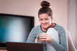 © blanke1973 - A young student girl is programming on a laptop and drinking coffee