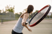 Woman Playing Tennis, Focus On Racket