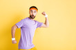 © LIGHTFIELD STUDIOS - shocked bearded man running on yellow
