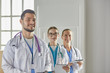 © lenetsnikolai - Portrait of group of smiling hospital colleagues standing together