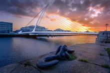 Amazing Sunset And Golden Hour At Samuel Beckett Bridge, Resembling A Harp. Fine Art Photography Of Dublin Cityscape, Ireland