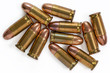 © vladographer - Pile of 9mm bullets on a white background. Image