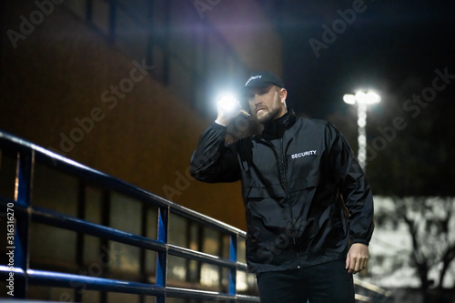 Fotografía Security Guard Walking Building Perimeter