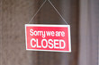 © Richard Johnson - Sorry we are closed sign in shop window door