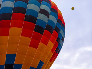 Colorful Hot Air Balloons flying over Cappadocia early morning in winter in Turkey