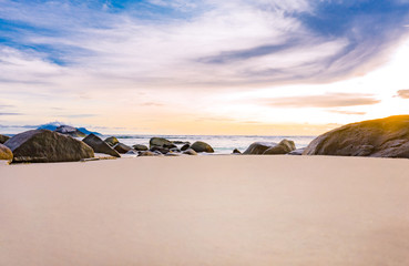 Tropical beach with white sand and rocks, copyspace for text. tropical summer holidays concept