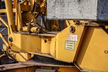 bulldozer at work with forbidden sign