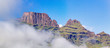 Panorama of Cathkin Peak and Monk's Cowl with lifting clouds, Drakensberg, South Africa