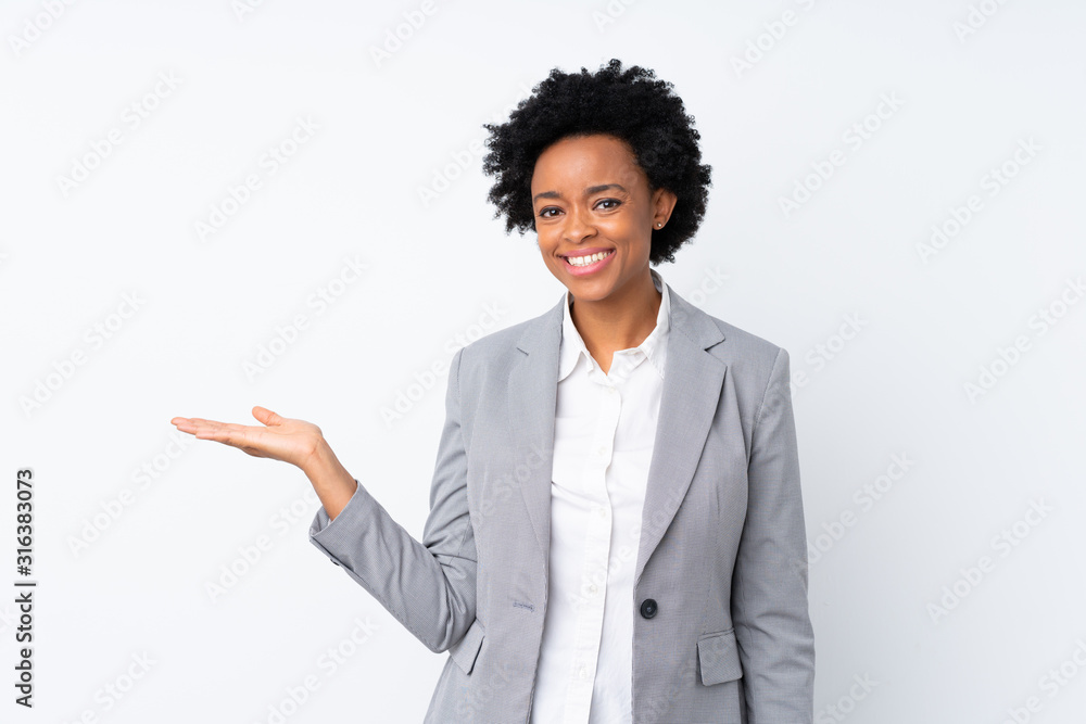 African american business woman over isolated white background holding ...