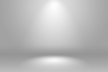 Abstract empty white and gray gradient soft light background of studio room for art work design.