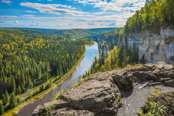 Wall Mural - Beautiful panoramic view of the river Usva, Perm Krai, and on a rock the devil's finger in the summer..