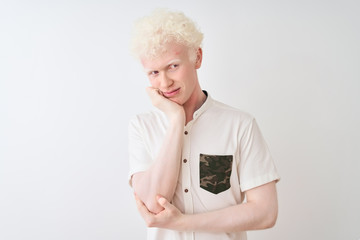 Wall Mural - Young albino blond man wearing casual shirt standing over isolated white background thinking looking tired and bored with depression problems with crossed arms.