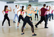 © JackF - Men women performing modern dance in fitness studio