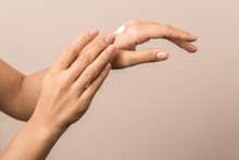 Healthy Hands Of A Young Woman Applying The Cream. Skincare Concept Beauty Photoshoot