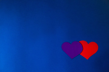 blue background, with space for text, with colored hearts, Valentine's day card