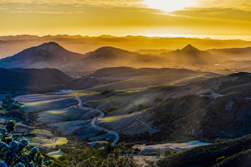 Wall Mural - Silhouetted Mountains at Sunset in Valley from View