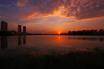 Wall Mural - Waterfront city scenery in the evening, China