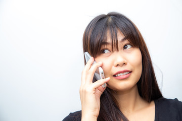 Wall Mural - Business asian women use smartphone call on white background