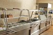 © New Africa - Serving line with tasty food in school canteen
