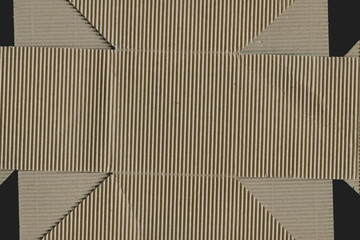 Close up grainy decorative light brown vintage rough sheet of carton. Cardboard paper texture blank background. Brown color old pattern empty papercraft surface. Recycled ecology friendly material.