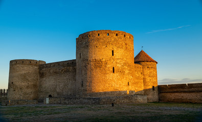 Wall Mural - Dawn near the castle in Belgorod-Dniester..