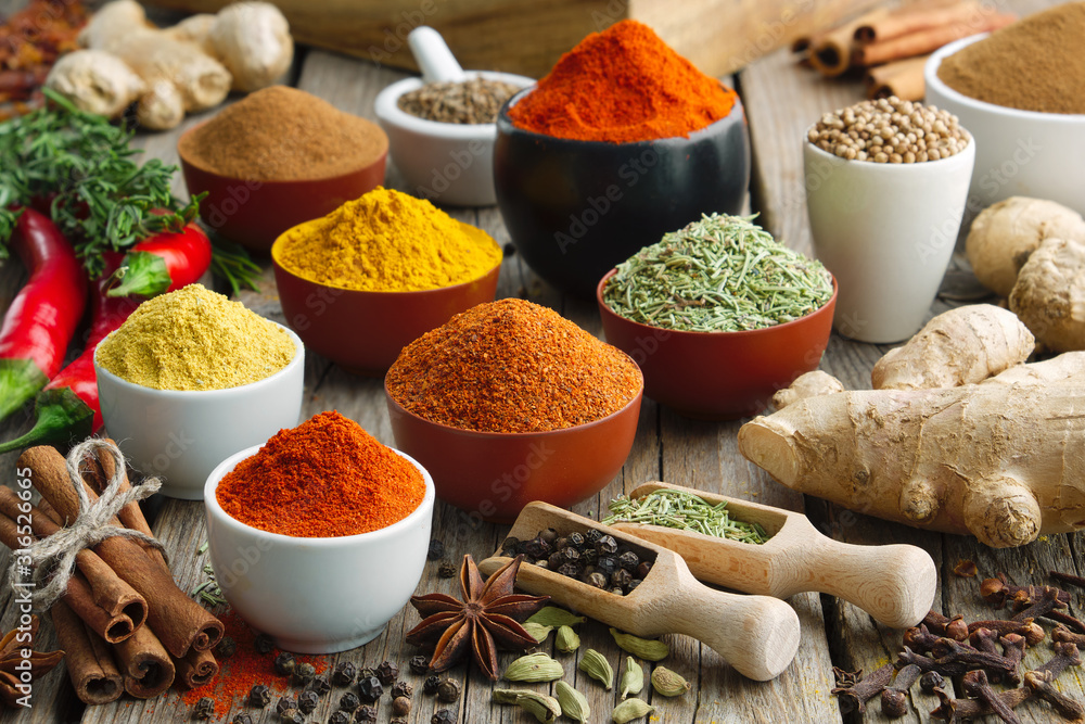Various aromatic colorful spices and herbs. Ingredients for cooking..Ayurveda treatments. - obrazy, fototapety, plakaty 