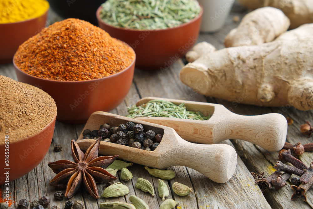 Aromatic spices and herbs. Ingredients for cooking. Ayurveda treatments.. - obrazy, fototapety, plakaty 