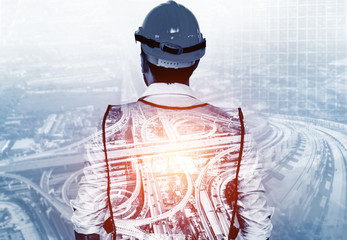 Wall Mural - Future building construction engineering project concept with double exposure graphic design. Building engineer, architect people or construction worker working with modern civil equipment technology.