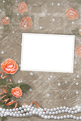 Holiday card with pearls, frame and bouquet of beautiful peach  roses on brown paper background