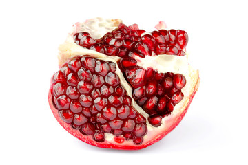 Wall Mural - Pomegranate slice isolated on white. Pomegranate with red ripe seeds isolated on a white background. Juicy ripe pomegranate seeds on a white background. Piece of pomegranate on a white background.