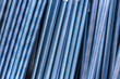 © petrsvoboda91 - Threaded metal rods. Technological background or texture. A number of threaded steel rods, may be used as background.